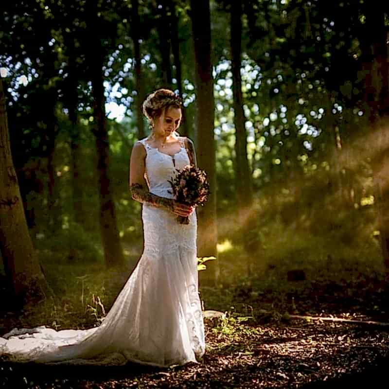 ethereal wedding photography of a bride in a forest